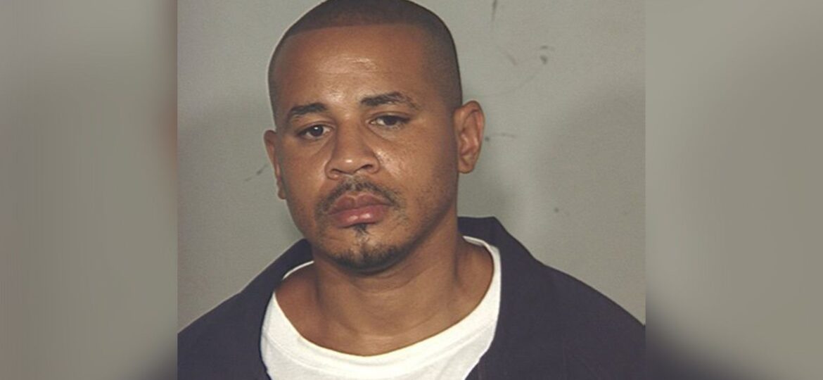 A man already serving 3 life sentences for murder was charged in a cold murder case in 2004