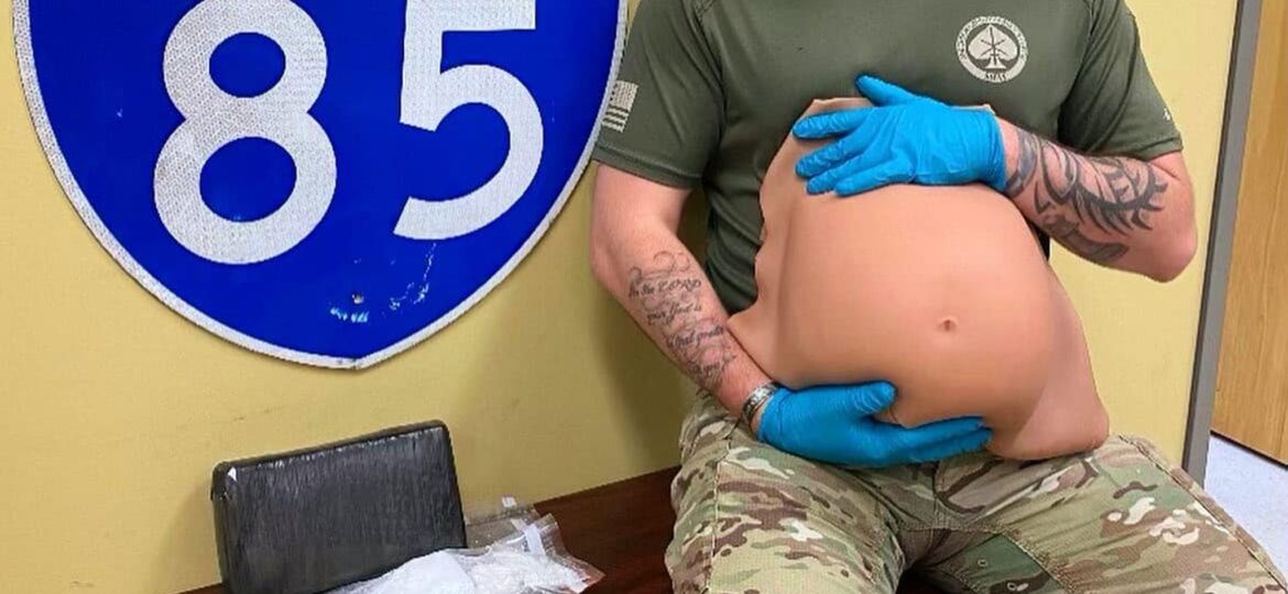 Couple arrested in South Carolina after 'using fake pregnancy belly to conceal more than 1,500g of cocaine'