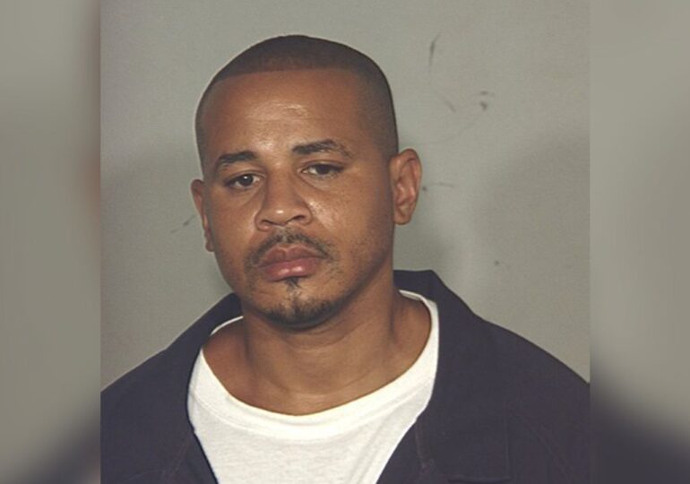 A man already serving 3 life sentences for murder was charged in a cold murder case in 2004