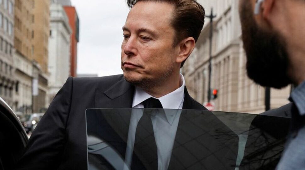 Elon Musk supports "Dilbert" creator Scott Adams on Twitter after his racist comments