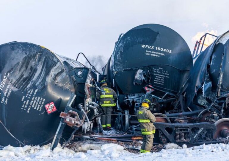 Crews work 24 hours to put out flames after a train carrying highly flammable ethanol derailed in Minnesota