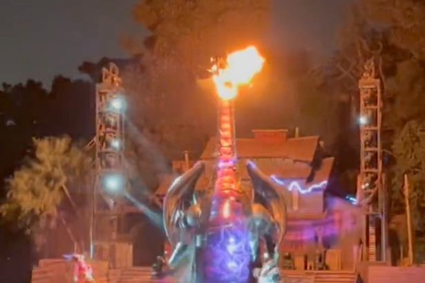 Disneyland fire-breathing dragon engulfed by flames during live performance of Fantasmic