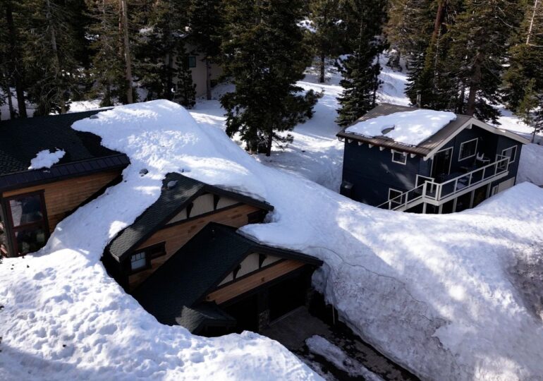 The big melt: Crushed houses, trapped cars and the threat of floods - inside California's buried ski resort