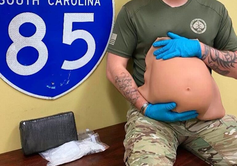 Couple arrested in South Carolina after 'using fake pregnancy belly to conceal more than 1,500g of cocaine'