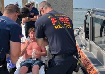 Man rescued from partially submerged boat after more than 24 hours at sea off coast of Florida